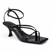 Black patent leather align thong ankle strap sandal with kitten heel for stylish wear