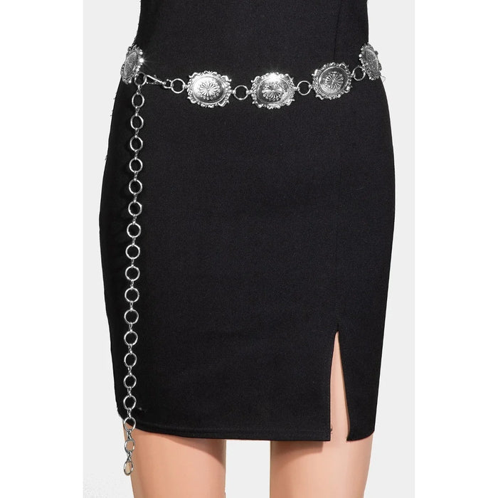 Ornate Almond Concho chain belt with medallions over a black skirt for stylish outfits