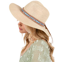 Beige woven straw sun hat with a boho pattern band for stylish summer protection