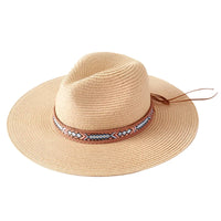 Beige woven straw hat featuring a stylish boho pattern band for sun protection