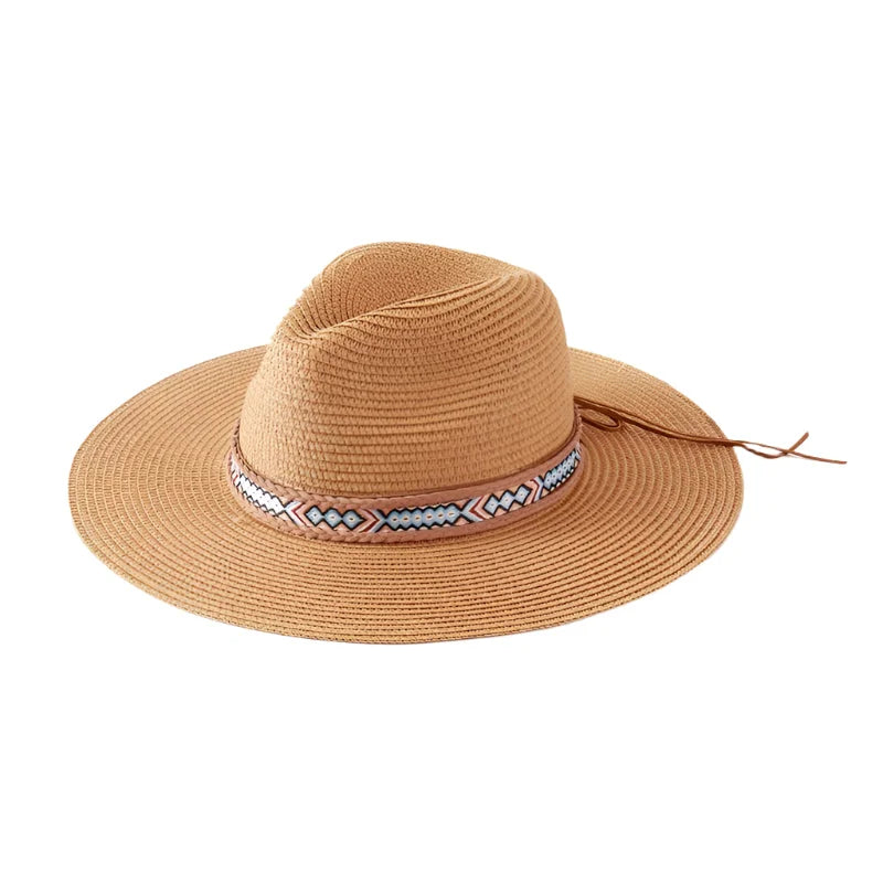 Tan woven straw sun hat featuring a stylish boho pattern band