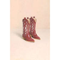Red leather Britney Cut Out Western boots with decorative white stitching and pointed toes