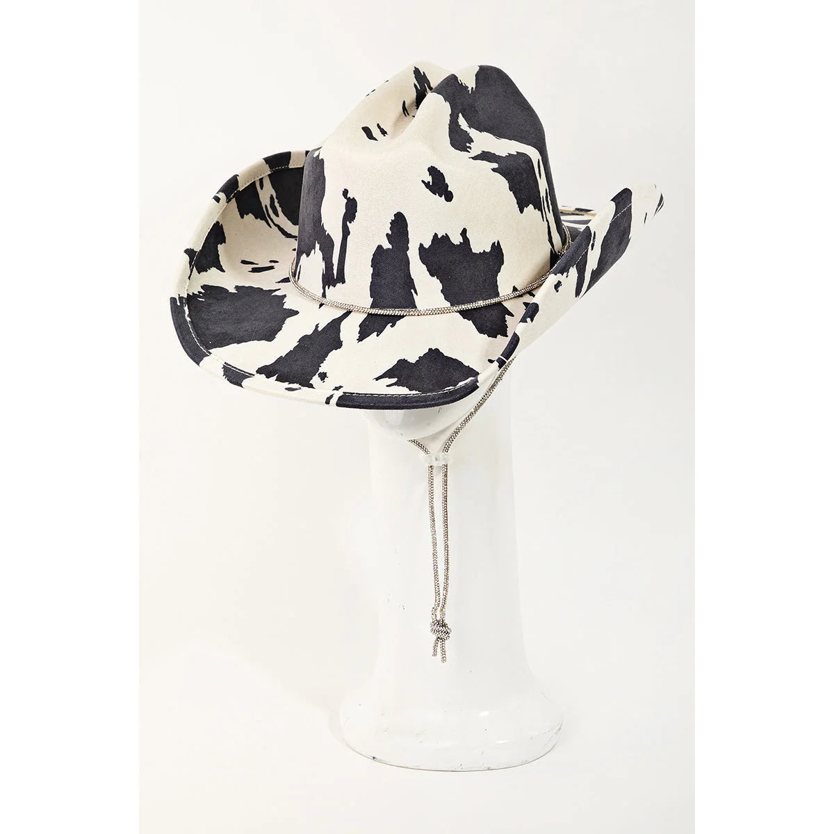 Cow Print Draw String Cowboy Hat featuring a stylish black and white cow print pattern