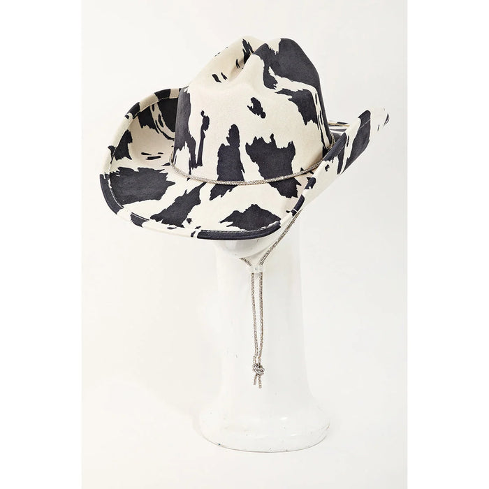 Cow Print Draw String Cowboy Hat featuring a stylish black and white cow print pattern