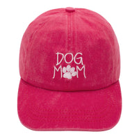 Pink Dog Mom Cap with white embroidery of ’DOG MOM’ and a paw print design