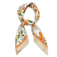 Floral print silk scarf in orange, green, and beige floral patterns