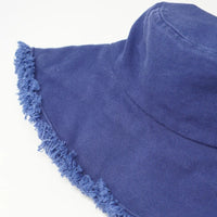 Blue fringed sun hat featured in the Keanu Twill Raw Edge Bucket Hat product