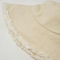 Cream-colored fringed bucket hat for stylish protection in the Keanu Twill Raw Edge design