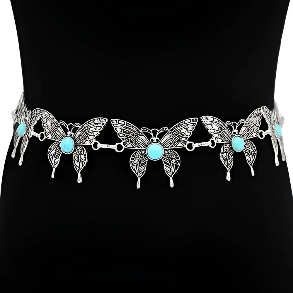 Silver butterfly belt with turquoise accents featuring metal link butterfly and butterfly concho cutout