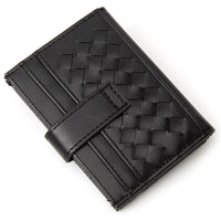 Black woven leather card holder with quilted weave pattern for stylish organization