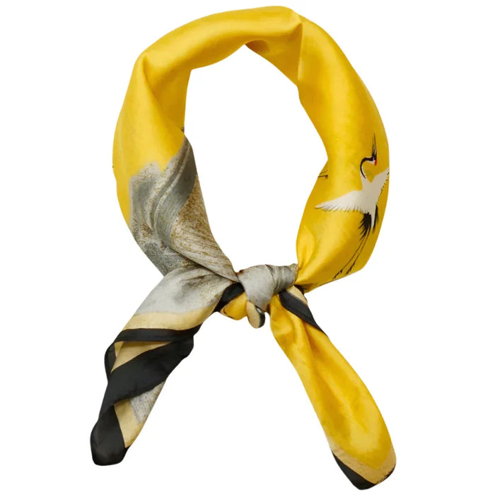 Yellow silk scarf featuring crane design from the So Silky Satin Neckerchief collection