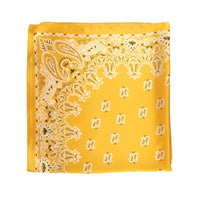 Yellow paisley bandana design on a silky satin neckerchief for stylish accessories