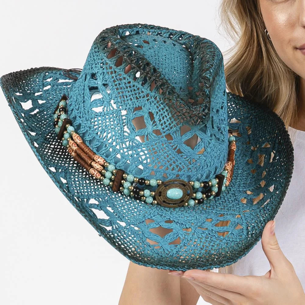 Turquoise stained open weave beaded cowboy hat with intricate craftsmanship