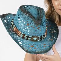 Turquoise stained open weave beaded cowboy hat with intricate craftsmanship
