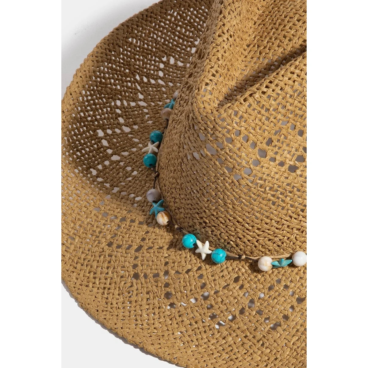 Woven straw sun hat with turquoise shell star beads and white beaded trim