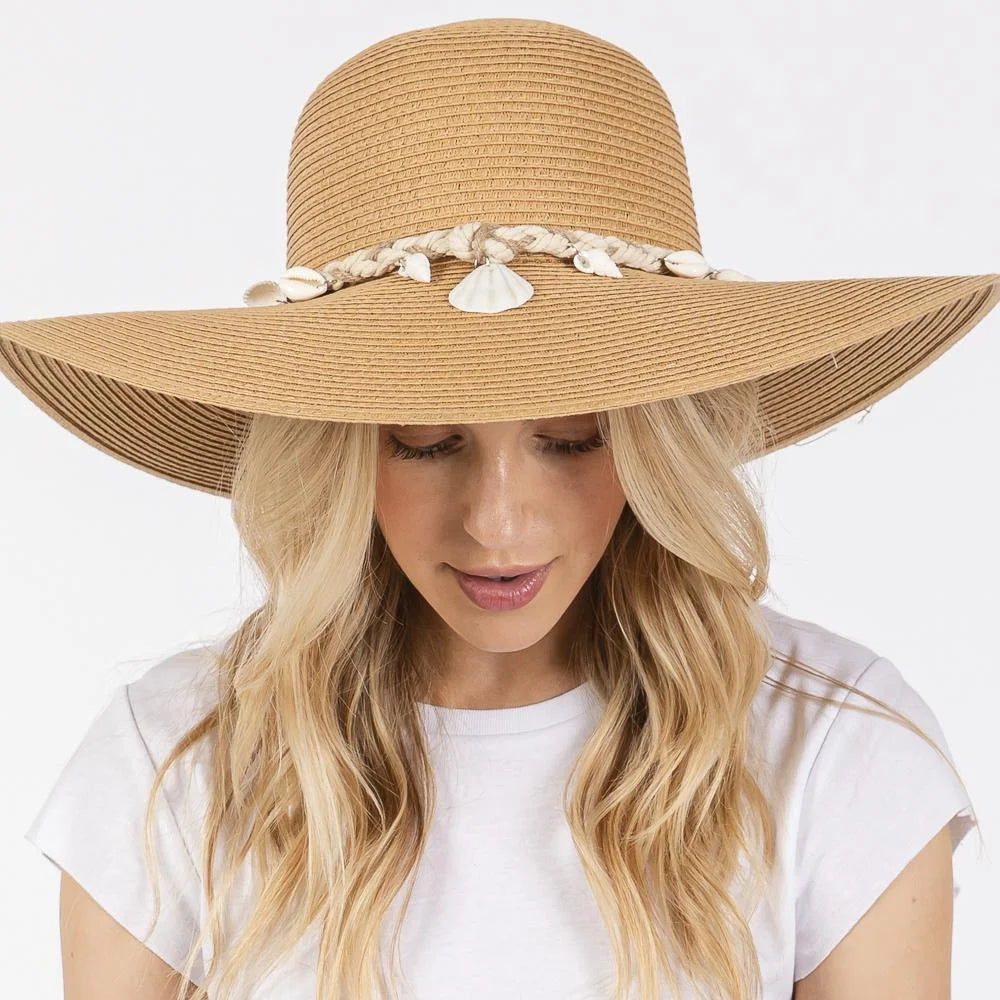 Wide brim straw sun hat with seashell accents and braided band for stylish sun protection