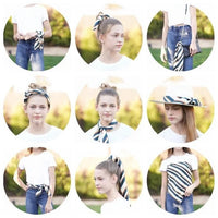 Girl showcasing nine stylish ways to wear the Zebra Silky Scarf with a striped design