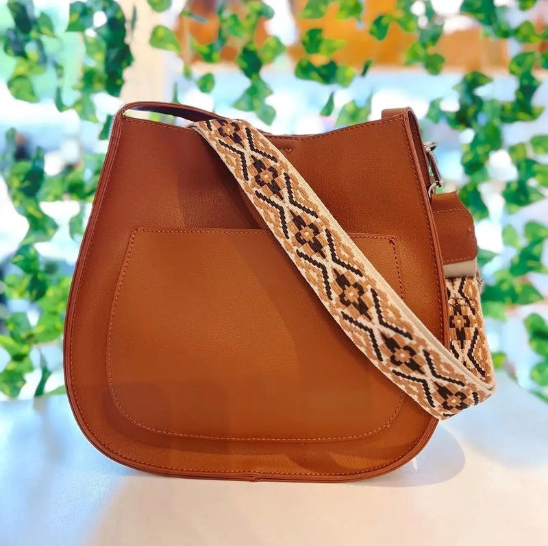 Brown leather handbag with woven strap from Del Mar’s Exclusive Bags &amp; Bag Accessories.