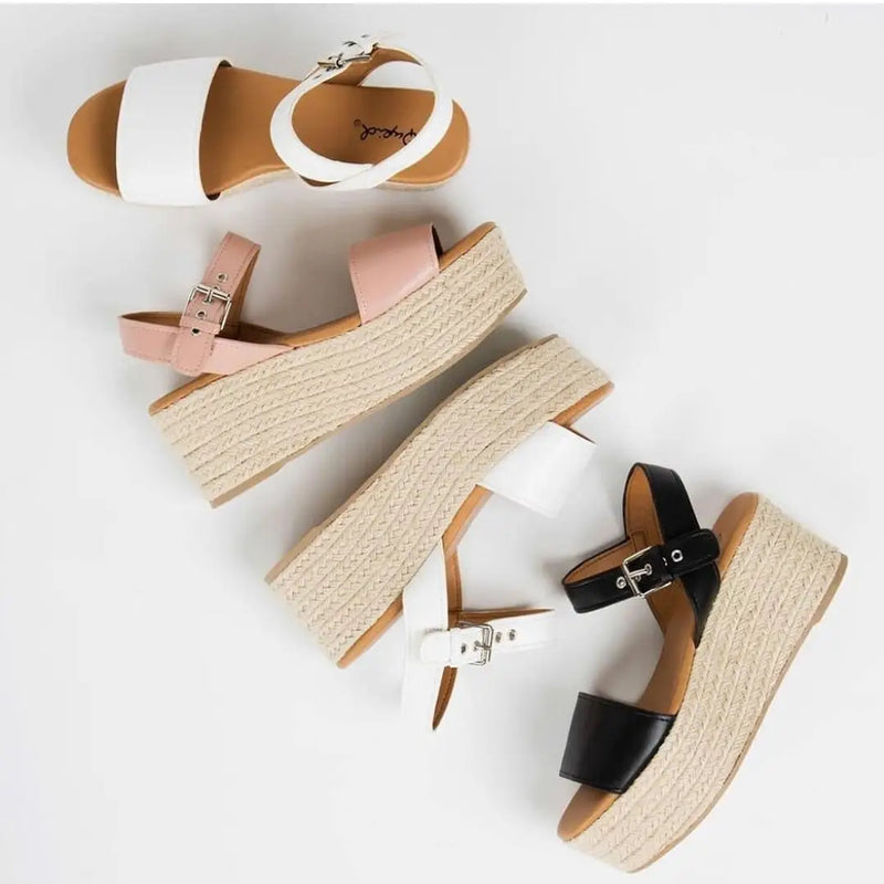 Collection of Del Mar women’s sandals, including strappy platform sandals and espadrille wedges.