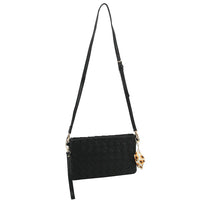 Black quilted crossbody handbag with gold hardware from the holder pouch set