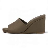 Khaki open-toe wedge slide sandals, angled side view with cushioned wedge sole