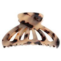 Tortoiseshell patterned hair clip on a white background
