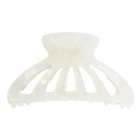 White hair clip on a white background