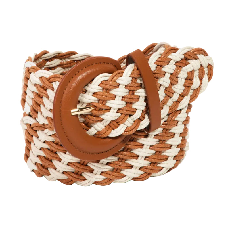 Woven handbag with brown leather handle on a white background