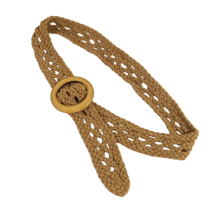 Crocheted belt with a gold buckle on a light pink background