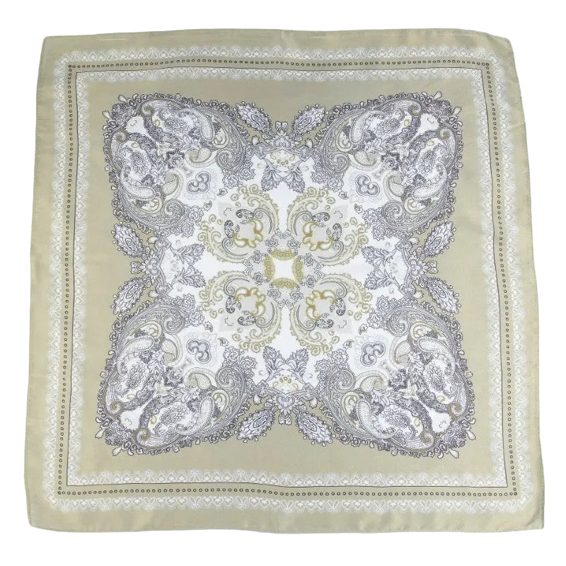 Decorative square cloth with intricate paisley pattern on a cream background