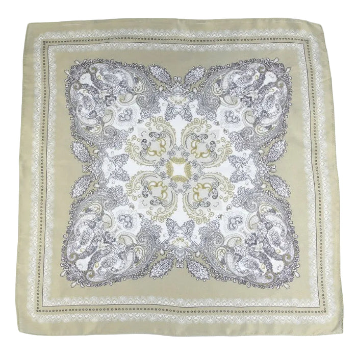 Decorative square cloth with intricate paisley pattern on a cream background