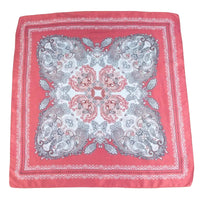 Pink bandana with paisley pattern on a white background