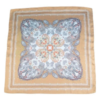 Decorative square scarf with intricate pattern on a beige background