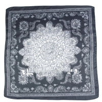 Black bandana with white paisley pattern on a white background