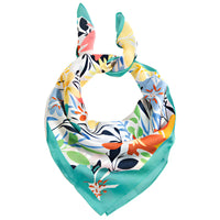 Colorful triangular floral print scarf featuring a vibrant abstract floral design