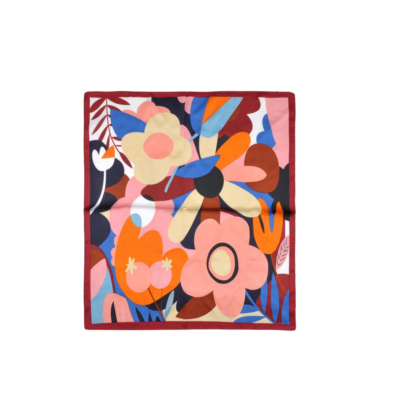 Colorful abstract flower print on a square scarf showcasing vibrant floral design