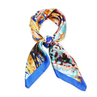 Colorful abstract satin scarf featuring an artistic pattern and blue border