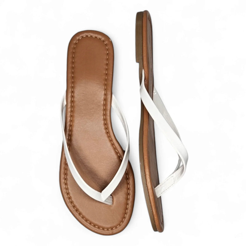 White leather thong sandals with tan sole ideal for summer flip flops