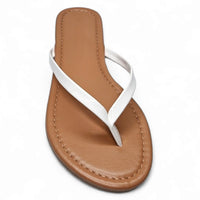 White leather thong sandal with tan sole perfect for summer flip flops style