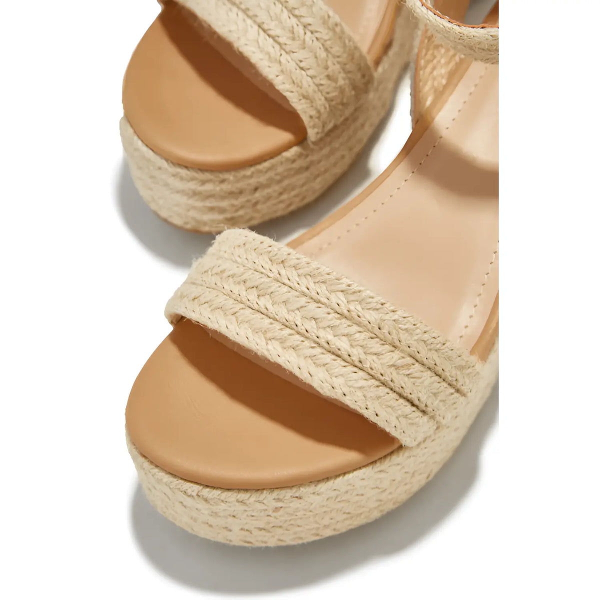 Beige platform wedge sandals with braided jute straps and stylish platforms