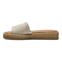 Beige leather slide sandal from Steve Madden Boardwalk Raffia Flatform collection