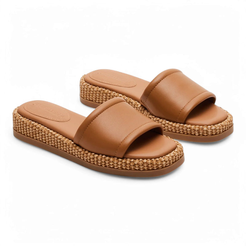 Brown leather slide sandals from Steve Madden Boardwalk with raffia flatform design