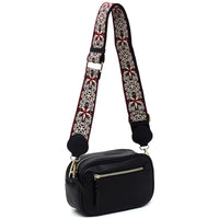 Black strap crossbody bag with embroidered floral guitar strap in red and white