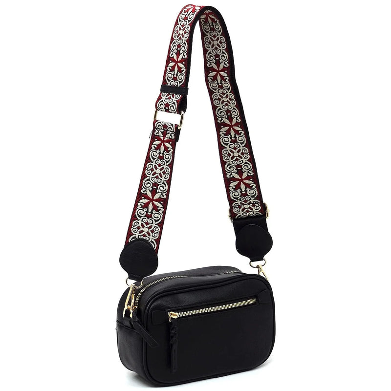 Black strap crossbody bag with embroidered floral guitar strap in red and white