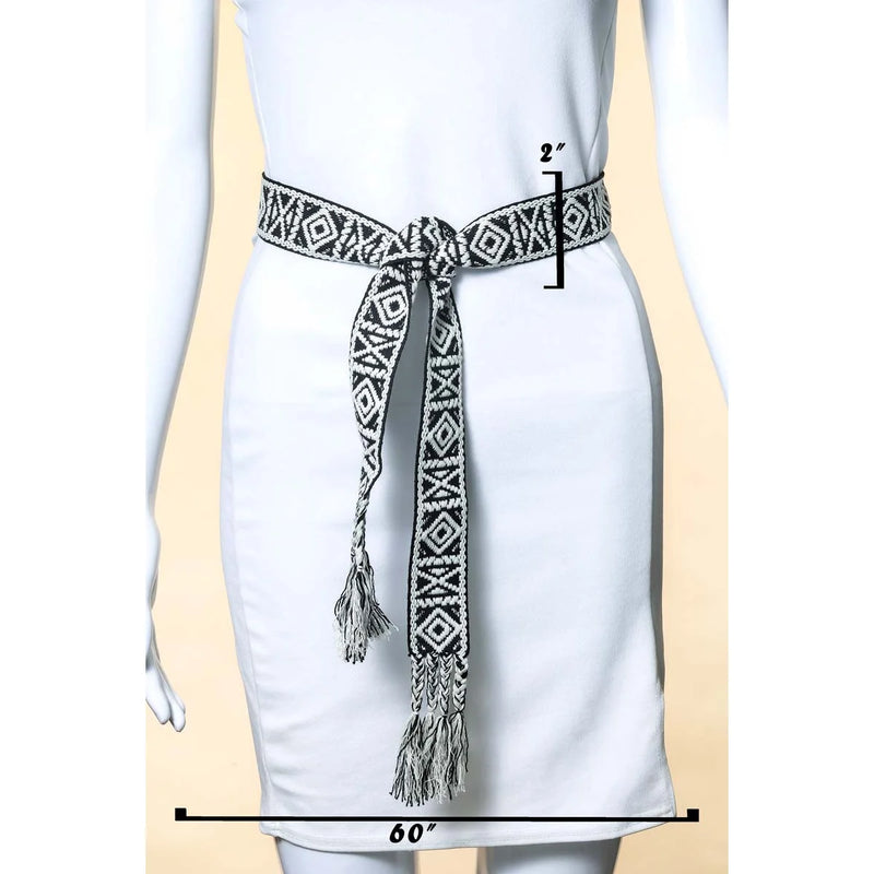 Decorative boho pattern braided belt with tassels tied around a white garment