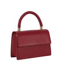 Red leather handbag with braided top handle and gold hardware, a stylish handle satchel