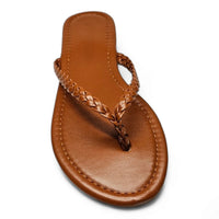 Brown leather braided thong sandal featuring a stylish braided thong strap