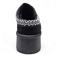 Black Brigham Platform Clog Slipper featuring decorative stitching around the opening