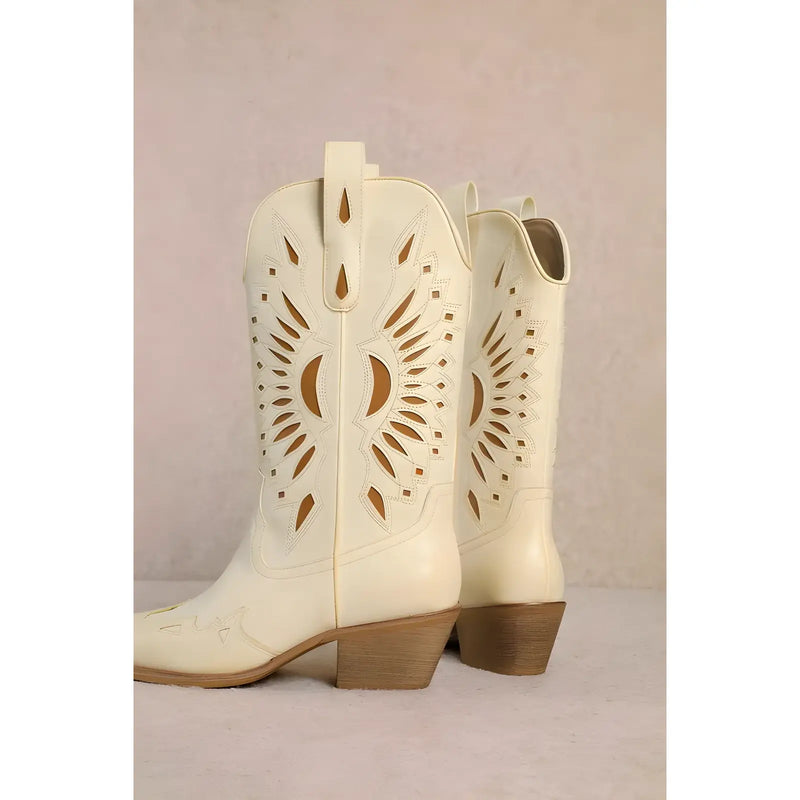 White leather Britney Cut Out Western Boots with decorative sunburst patterns