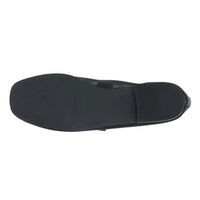 Black leather dress shoe sole of Bronx Ballet Flats showcasing comfort and style